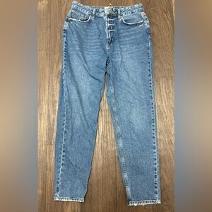 Urban Outfitters BDG Mom High-Rise Jeans in a classic vintage light wash.